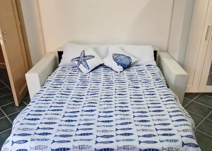 Corallo Bilocale Vista Collina Апартаменты *