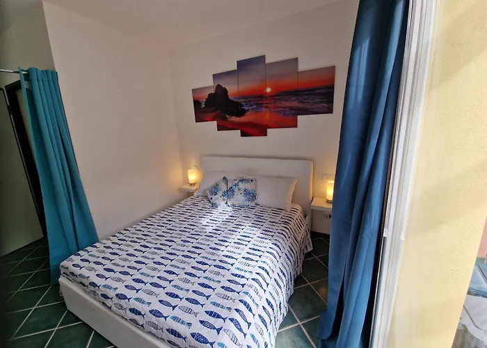 Corallo Bilocale Vista Collina Апартаменты *